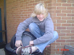 /images/cooper_on_trash_can_250x187.jpg